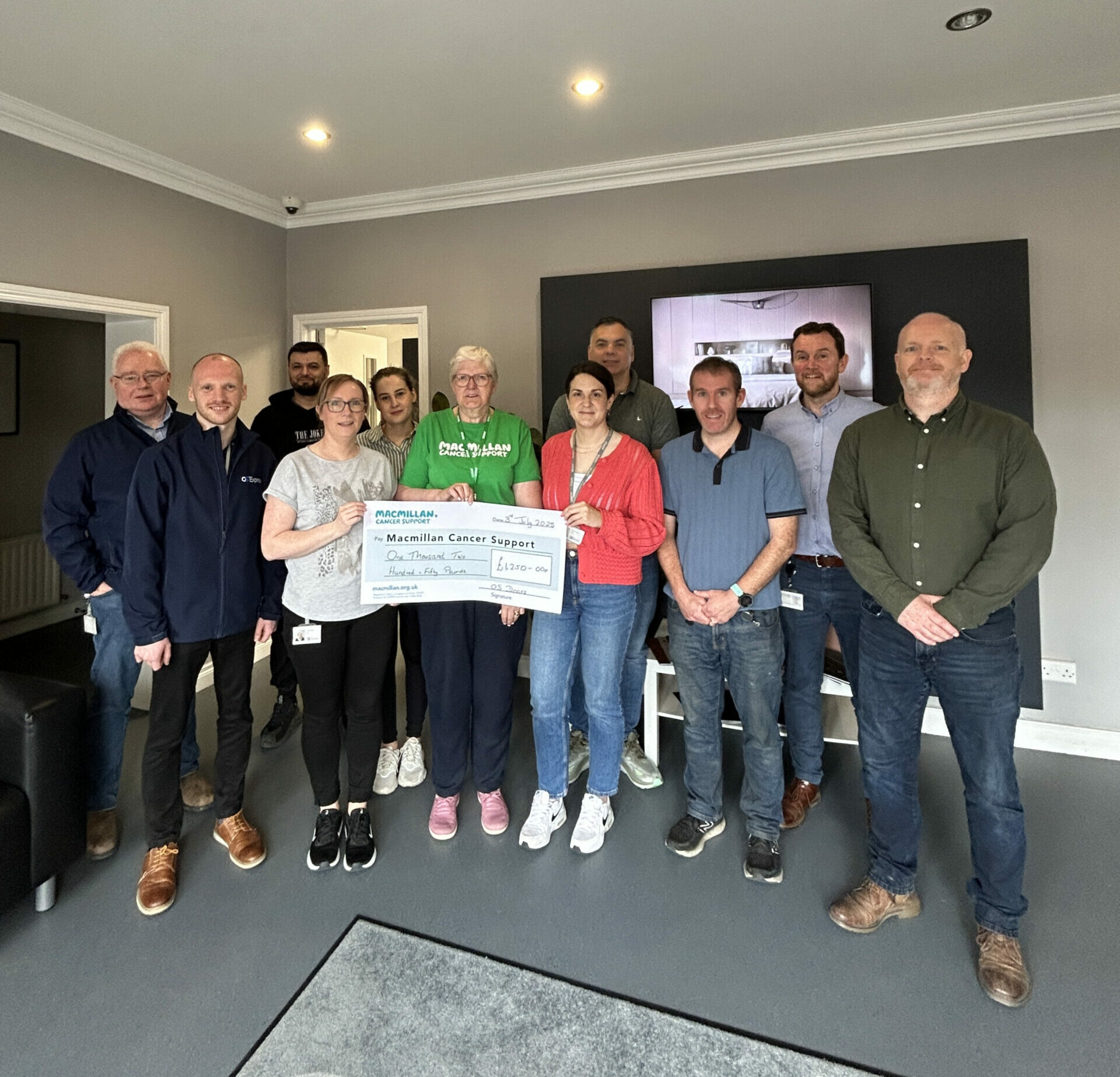 Macmillan Cancer Care Cheque Presentation Image